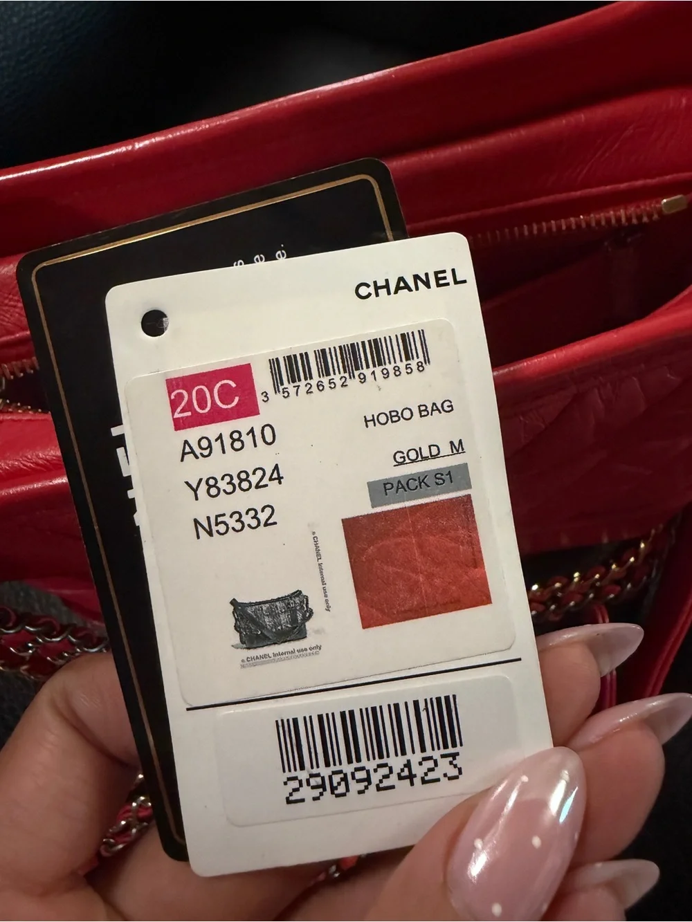 CHANEL Red Quilted Shoulder Bag with Gold CC Charm
